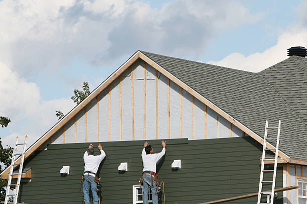 Professional Storm Damage Siding Repair technician working in Winnetka, IL